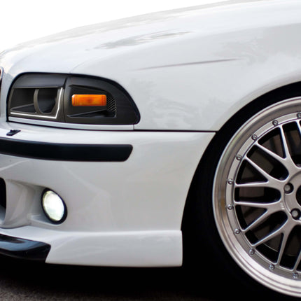 Upgrade your BMW E39 with custom aero parts like front splitters, side skirts, spoilers, and diffusers for enhanced aerodynamics, performance, and a sleek appearance