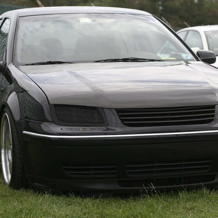 Upgrade your Volkswagen Jetta MK4 with custom aero parts like front splitters, side skirts, spoilers, and diffusers for improved aerodynamics, performance, and style