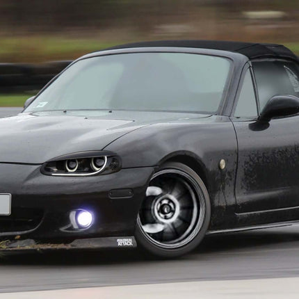 Upgrade your Mazda Miata NB (1999-2001) with custom aero parts like front splitters, side skirts, spoilers, and diffusers for enhanced aerodynamics, performance, and aggressive styling