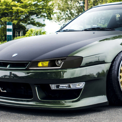 Enhance your Nissan S14 with custom aero parts like front splitters, side skirts, spoilers, and diffusers for improved aerodynamics, performance, and a more aggressive look