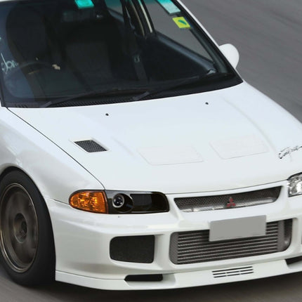 Upgrade your Mitsubishi Evolution 1, 2, and 3 with custom aero parts like front splitters, side skirts, spoilers, and diffusers for improved aerodynamics and performance