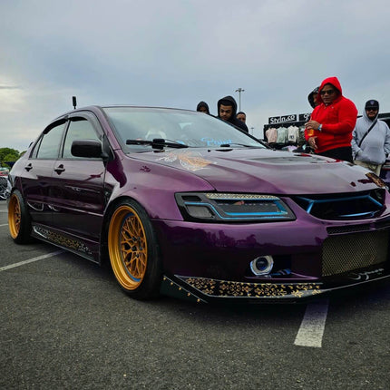 Upgrade your Mitsubishi Evolution 7, 8, or 9 with custom aero parts like front splitters, side skirts, spoilers, and diffusers for improved aerodynamics, performance, and aggressive styling