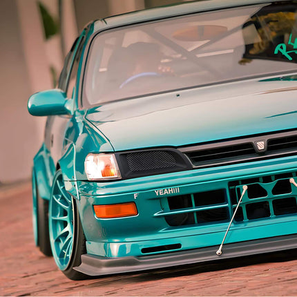 Toyota Corolla AE100 turbocharger kit, high-boost ball-bearing turbo, stainless steel turbo manifold, race-tuned ECU, external wastegate, increased power output, dyno-proven horsepower gains, track-ready forced induction system.

