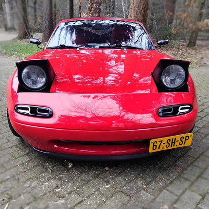 Coilover suspension for MX-5 Miata NA improves handling, ride comfort, and adjustability for a sportier feel.