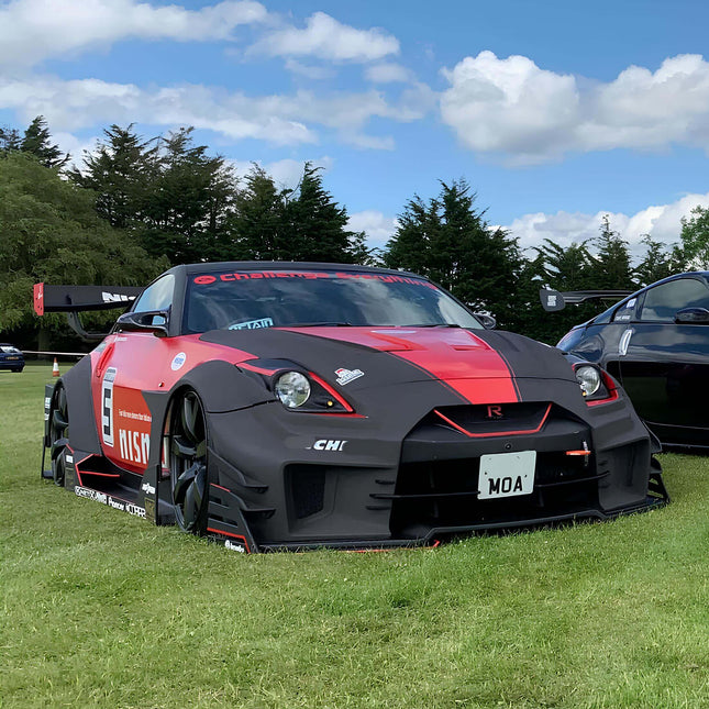 Nissan 350Z twin-scroll turbo upgrade, race-proven forced induction setup, high-boost efficiency, improved throttle response, dyno-tested horsepower gains, track-ready turbo performance.

