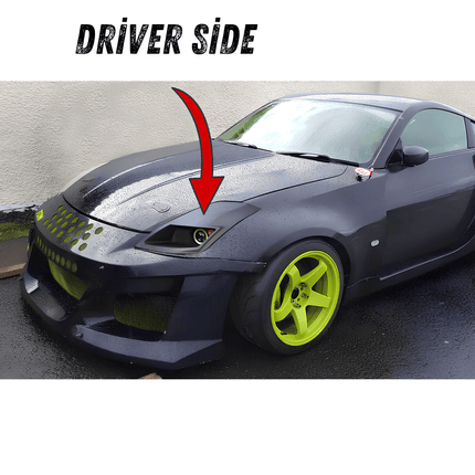 Nissan 350Z front splitter, carbon fiber aerodynamic upgrade, increased front-end downforce, race-proven track stability, aggressive styling, lightweight design.

