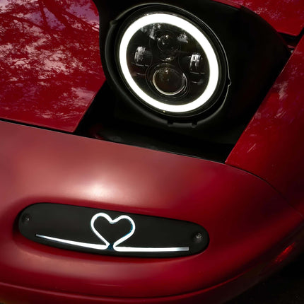 Short shifter for MX-5 Miata reduces gear throw, improving shifting speed and precision.