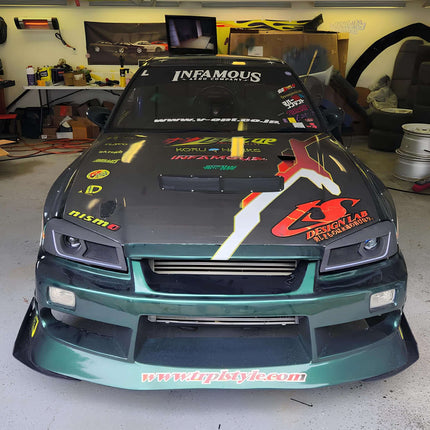 Nissan Skyline R34 roll cage, FIA-approved high-strength tubular steel construction, increased chassis rigidity, track-ready safety upgrade, lightweight performance mod.

