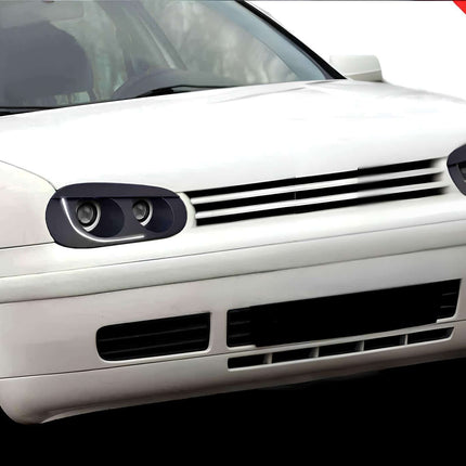 Golf Mk4 GTI smoked projector headlights, black housing LED DRL retrofit, sequential turn signals, high-output xenon HID kit, custom aftermarket headlamp upgrade, enhanced night vision, road-legal headlight conversion, modern styling.

