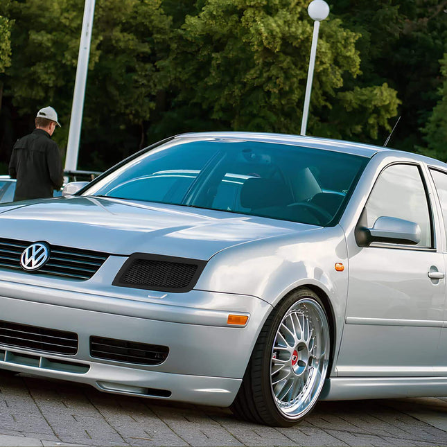 Volkswagen Jetta MK4 big brake kit, lightweight multi-piston calipers, drilled and slotted rotors, high-friction ceramic brake pads, track-ready braking performance.

