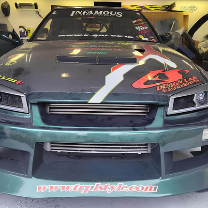 Nissan Skyline R34 lightweight racing dashboard, carbon fiber construction, improved weight distribution, race-spec cockpit styling, high-performance interior weight reduction.

