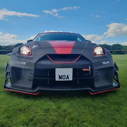 Nissan 350Z rear fender air vents, high-performance cooling enhancement, track-proven heat dissipation, aggressive exterior styling, race-ready bodywork upgrade.

