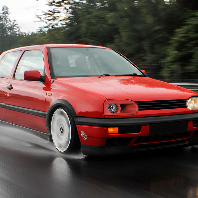 VW Golf MK3 GTI Wheels & Lowered Suspension Kit – Upgrade your 95-98 Golf MK3 with GTI-style wheels and a coilover suspension kit. Achieve a lower stance and aggressive look while improving handling and performance for a sporty driving experience.

