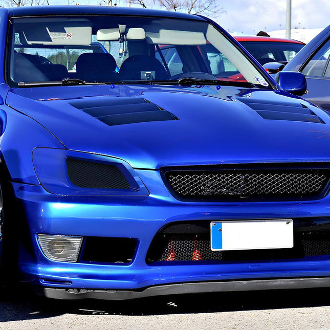 "A high-performance Altezza drifting around a corner, showcasing its balanced weight distribution and precise handling."
