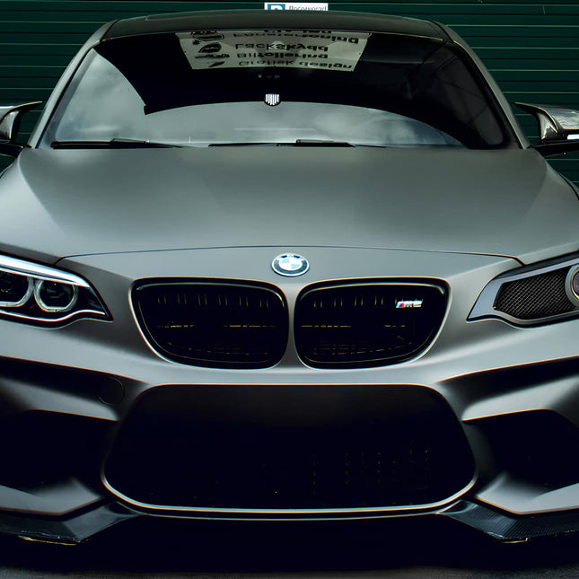 Revitalize your BMW 2 Series F22, F23, F87, F88 with our aftermarket headlight upgrade, offering custom LED lighting, aggressive styling, and optimized air intake for enhanced engine efficiency.