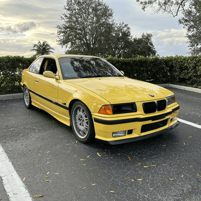 BMW E36 stainless steel exhaust system with high-flow catalytic converters and aggressive sound tuning for increased horsepower and torque. A must-have upgrade for performance enthusiasts.