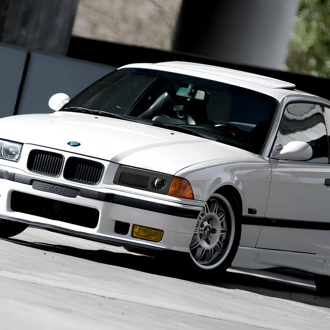 BMW E36 rear spoiler wing for better aerodynamics, improved high-speed stability, and aggressive styling.
