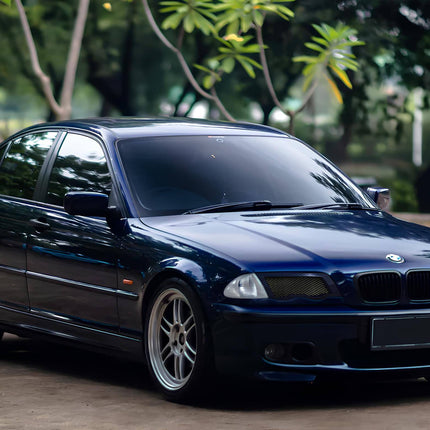 BMW E46 carbon fiber mirror caps, high-performance styling mod, 330i aerodynamic mirror upgrade, E46 M3-style side mirrors, 325i aggressive exterior styling, lightweight carbon fiber, track-ready mirror replacement, custom visual enhancement.