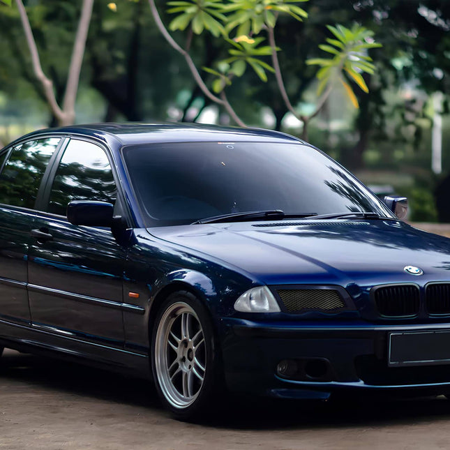BMW E46 carbon fiber mirror caps, high-performance styling mod, 330i aerodynamic mirror upgrade, E46 M3-style side mirrors, 325i aggressive exterior styling, lightweight carbon fiber, track-ready mirror replacement, custom visual enhancement.