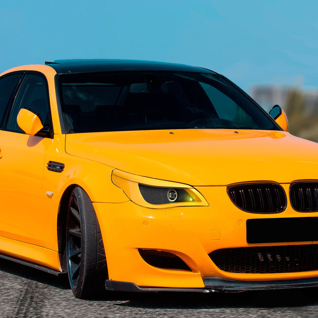 BMW E60 Carbon Fiber Side Mirror Covers – Lightweight carbon fiber mirror caps for BMW E60 and E61, providing an aggressive motorsport-inspired look while reducing aerodynamic drag and enhancing exterior aesthetics.

