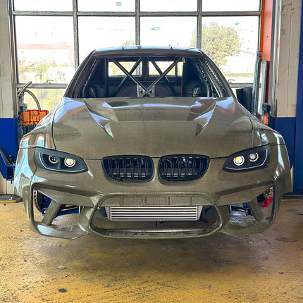E92 cold air intake system, high-flow air filter, E93 performance air intake, optimized throttle response, 335i cold air intake mod, M3 racing intake kit, track-ready engine airflow upgrade, aggressive induction system, high-performance air delivery.