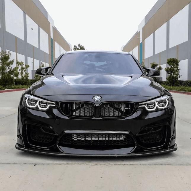 Strut tower brace for BMW M3 GT4 enhances chassis rigidity, reducing body flex and improving handling.