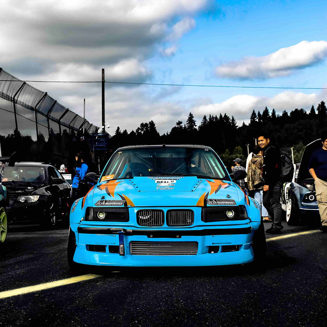 Lightweight underdrive pulleys for BMW E36 reduce accessory drag, freeing up horsepower. | 36. Carbon fiber rear diffuser for BMW E36 enhances aerodynamics and aggressive styling.