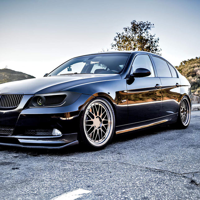 BMW E90 rear diffuser, carbon fiber performance diffuser, aggressive rear styling, E90 aerodynamic rear diffuser, M3-style rear bumper, track-ready diffuser, BMW 335i carbon rear lip, sport rear bumper, E90 underbody airflow control.