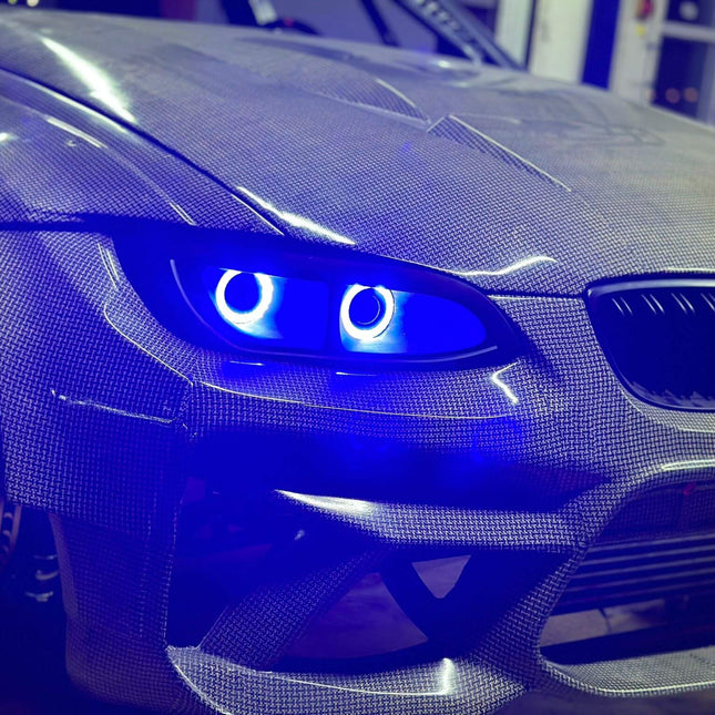 BMW E90 titanium exhaust system, lightweight performance exhaust, 335i cat-back exhaust, E90 deep sound exhaust, BMW 328i high-flow muffler, race-tuned exhaust system, performance resonator delete, track-spec exhaust, aggressive exhaust sound.


