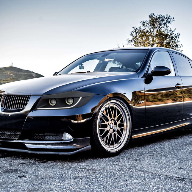 BMW E90 performance wheel spacers, aggressive fitment mod, 335i extended wheel stance, E90 custom offset spacers, BMW 328i wide stance upgrade, track-ready handling enhancement, high-quality hub-centric spacers, aluminum construction wheel spacers.

