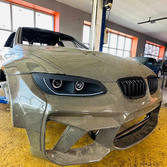 BMW E90 racing harness seat belts, high-performance driver safety, 335i track-ready harness, E90 M3-spec seat belt upgrade, BMW 328i five-point harness, racing-approved safety belts, FIA-approved seat harness, track-spec interior mod.

