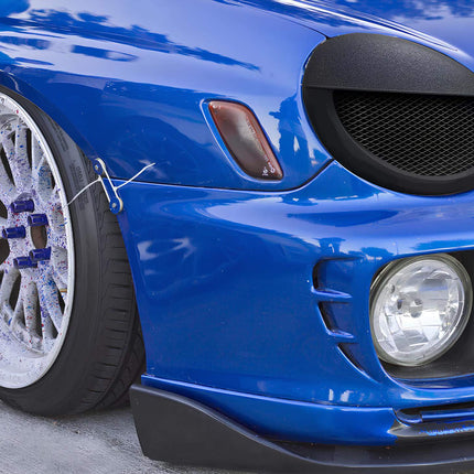 2002 WRX STI upgraded lower control arms, high-performance suspension geometry, improved chassis rigidity, optimized high-speed cornering.

