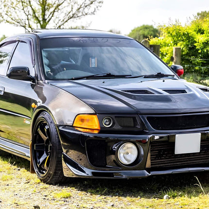 Lancer Evolution V, VI upgraded intercooler kit, oversized aluminum core, optimized airflow, reduced intake temperatures, track-ready forced induction cooling, race-proven high-efficiency boost system.

