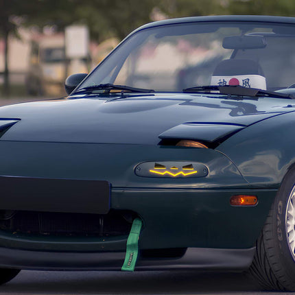 Miata MX-5 NA Roadster roll cage, NHRA-approved welded roll bar, bolt-in chassis reinforcement, high-strength tubular steel construction, track-spec safety upgrade, lightweight performance, high-speed race protection.

