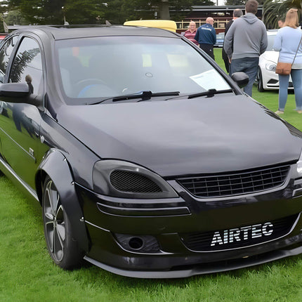 "A compact Corsa hatchback with a rounded design, known for its practicality and efficiency in urban driving."