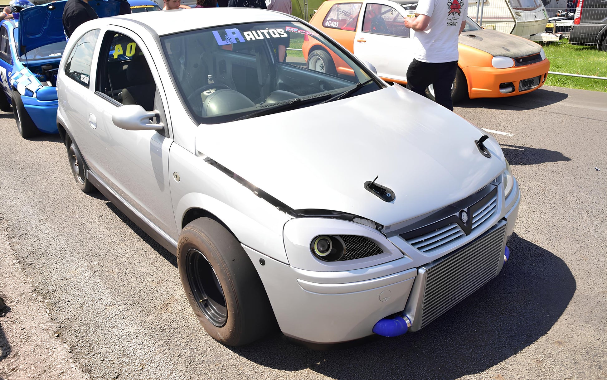 Aftermarket performance headlight air vent, compatible with 2.5-inch xenon headlights, offering a sleek, customizable look for Chevrolet Corsa and its counterparts