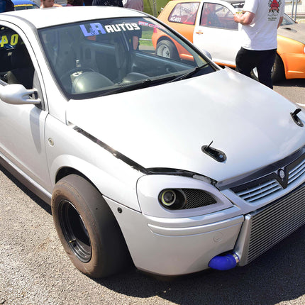 Vauxhall Corsa rear subframe reinforcement brace, improved chassis stiffness, track-tuned handling upgrade, aggressive cornering response, race-spec rigidity enhancement.

