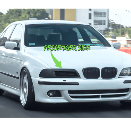 A BMW E39 5 Series equipped with aftermarket modifications, including a lowered suspension and custom exhaust, reflecting the model's popularity within the car enthusiast community for personalization.


