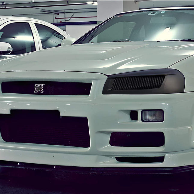 Nissan Skyline R34 forged aluminum wheels, deep dish staggered fitment, JDM concave profile, lightweight racing rims, track-ready handling upgrade.

