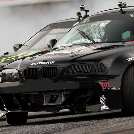 BMW E46 rear diffuser upgrade, carbon fiber aerodynamic rear bumper, aggressive styling mod, track-ready rear airflow optimization, BMW 330i performance rear diffuser, 325i race-inspired rear-end styling, high-performance carbon fiber upgrade.