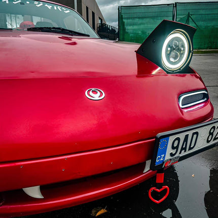 Miata MX-5 NA Roadster front bumper LED turn signals, switchback sequential flashers, high-intensity amber indicators, plug-and-play upgrade, enhanced road visibility, stylish front-end upgrade.

