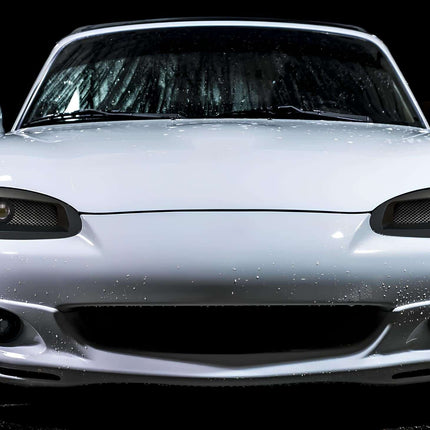 Miata MX-5 NB2 upgraded ignition coil, performance spark plugs, high-energy ignition wires, improved combustion efficiency, high-rev power delivery, race-spec ignition timing, dyno-proven fuel efficiency, high-performance tuning.


