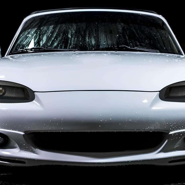 Miata MX-5 NB2 upgraded ignition coil, performance spark plugs, high-energy ignition wires, improved combustion efficiency, high-rev power delivery, race-spec ignition timing, dyno-proven fuel efficiency, high-performance tuning.

