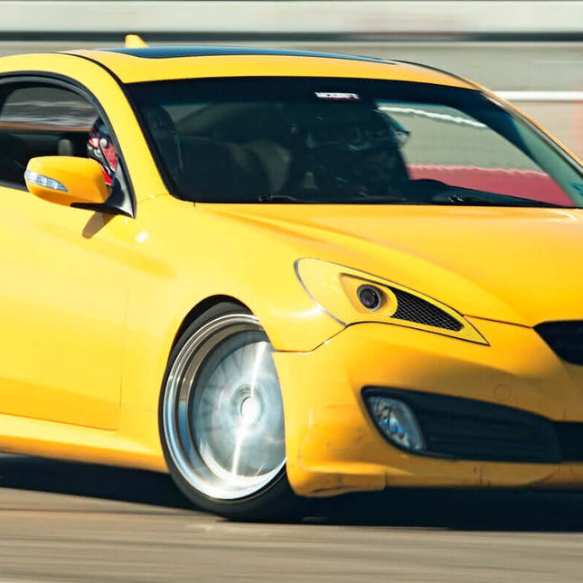 Hyundai Genesis Coupe high-performance camshafts, upgraded valve springs, adjustable cam gears, race-spec valvetrain components, optimized engine timing, improved high-RPM power, forced induction compatibility, track-tuned engine.

