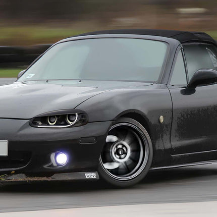 Mazda Miata MX-5 NB1 racing seats, carbon fiber bucket seats, lightweight structure, track-ready bolstered support, suede or leather finish, high-performance interior upgrade, aggressive seating position, JDM cockpit design.

