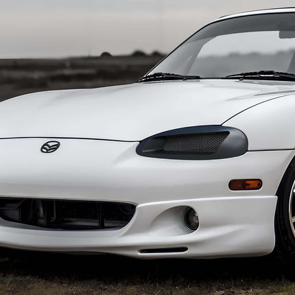 Mazda Miata MX-5 NB2 performance oil cooler, external oil cooling system, high-temperature endurance, track-spec lubrication, extended engine life, reduced heat soak, forced induction reliability, high-performance cooling.

