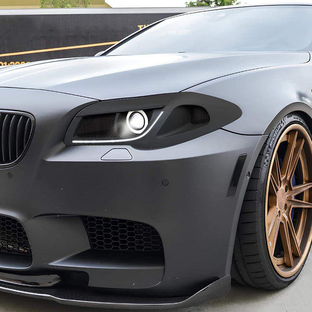 F10 high-performance brake kit, F11 big brake upgrade, F18 drilled and slotted rotors, 5 Series track-ready braking system, race-spec brake calipers, aggressive stopping power.

