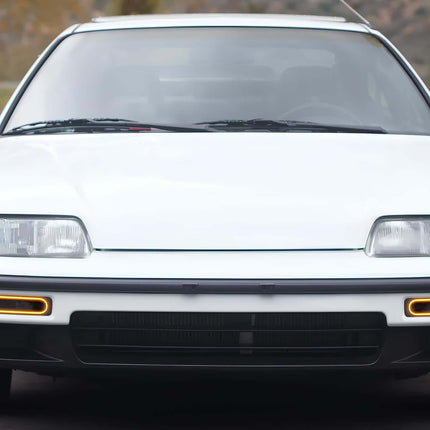 Honda Civic CRX 90-91 body kit, front bumper, side skirts, rear bumper, carbon fiber hood, JDM fender flares, lip spoiler, rear diffuser, grille, hood vents, widebody kit, lightweight panels, track-ready styling, aggressive aerodynamics.

