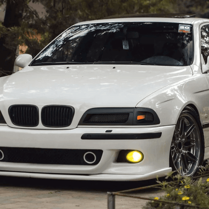 E39 high-performance brake kit, big brake upgrade, drilled and slotted rotors, track-ready brake pad system, aggressive stopping power, race-spec caliper upgrade, lightweight ceramic braking improvement.

