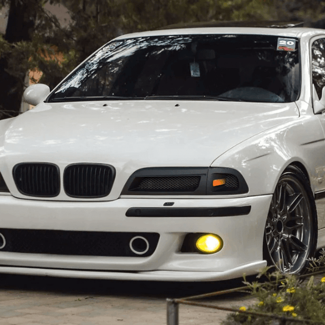 E39 high-performance brake kit, big brake upgrade, drilled and slotted rotors, track-ready brake pad system, aggressive stopping power, race-spec caliper upgrade, lightweight ceramic braking improvement.

